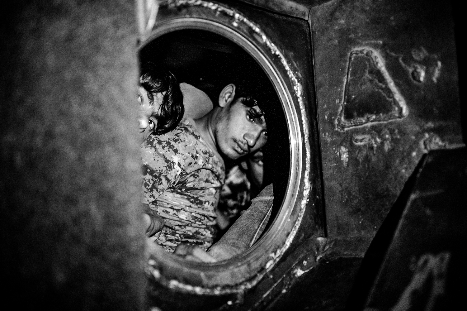 August 6, 2018

Iran, Sistan and Baluchistan province. Afghan refugees are in the bus fuel tank for about 30 hours. they are going to their destination in Tehran. In each fuel tank ride 7 persons, there is possibility of asphyxiation for them. They must be get out before reaching to each checkpoint and round the checkpoint with a motor or car and re-enter in the bus fuel tank.